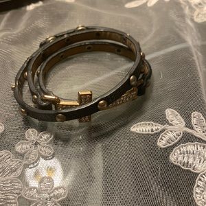 Multi swirl cross band bracelet